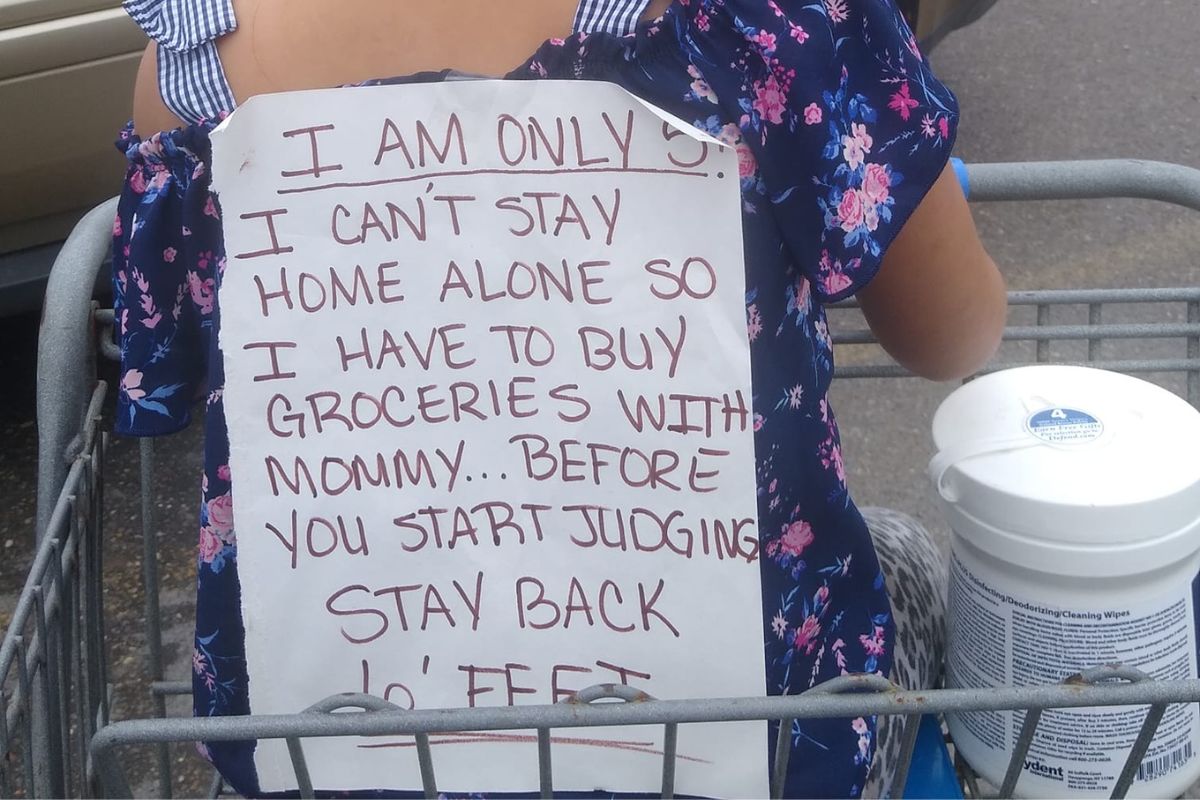 Mom Tapes Sign To Daughters Back